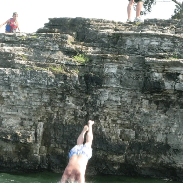 Cliff jumping and lake swimming on Table Rock Lake Missouri.