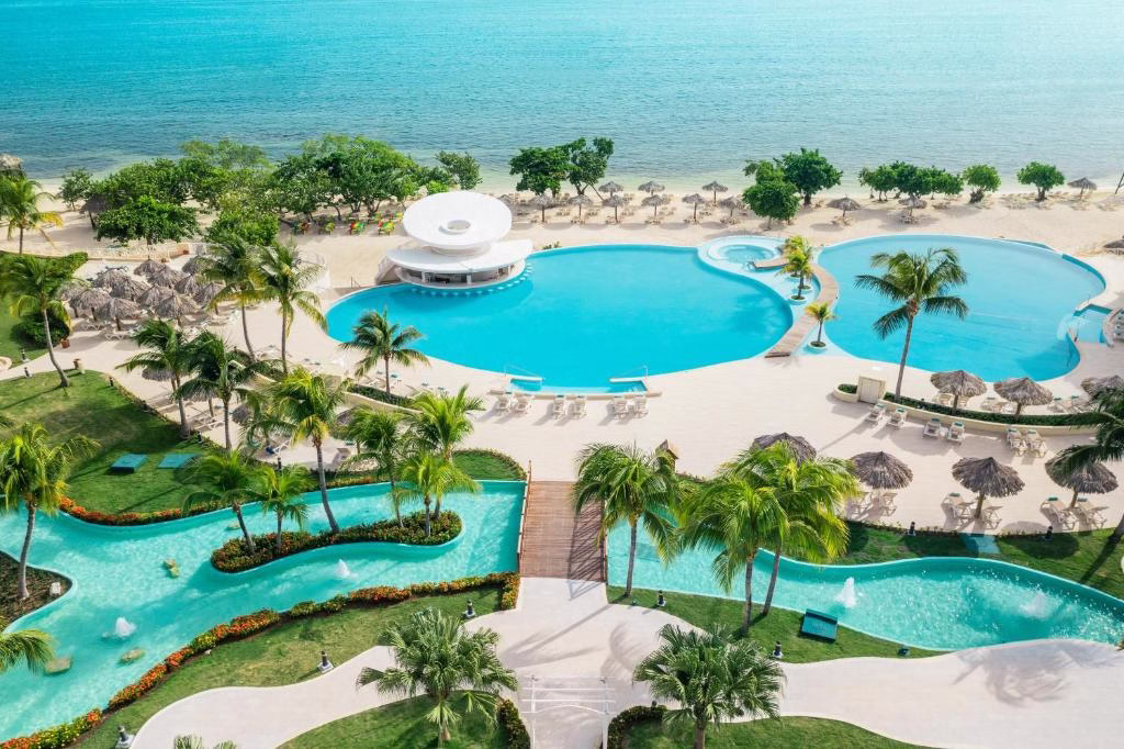 an aerial view of the lazy river at Iberostar Waves Rose Hall Beach - All Inclusive in Montego Bay