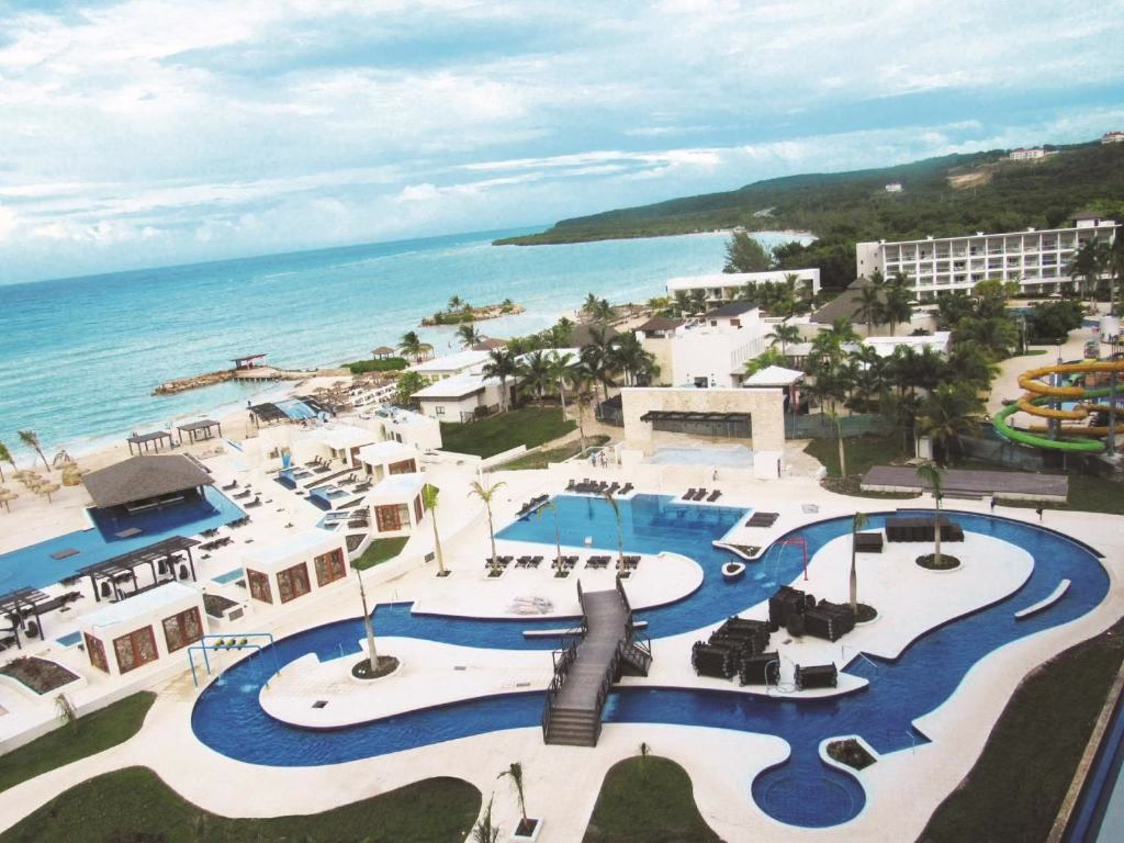 an aerial view of the lazy river at Royalton Blue Waters Montego Bay, An Autograph Collection All-Inclusive Resort in Falmouth